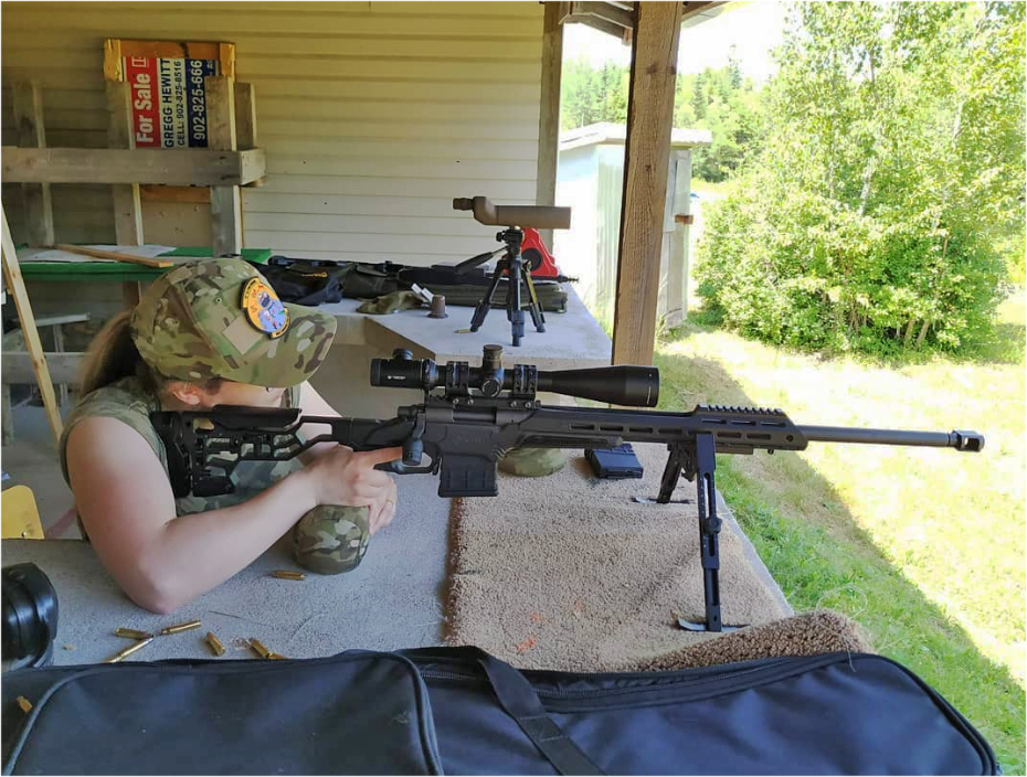 Mrs. 2CentTac on the gun with an MDT Tac 21 ESS, a Trigger Tech Diamond, and Vortex Viper PST on a Remington 700 with Spuhr mount